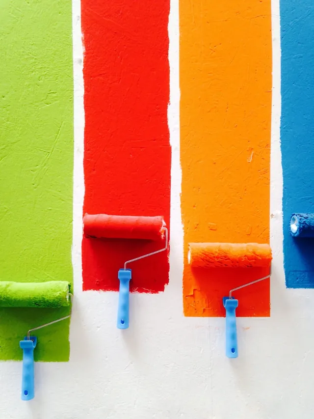 Paint rollers in brand colours