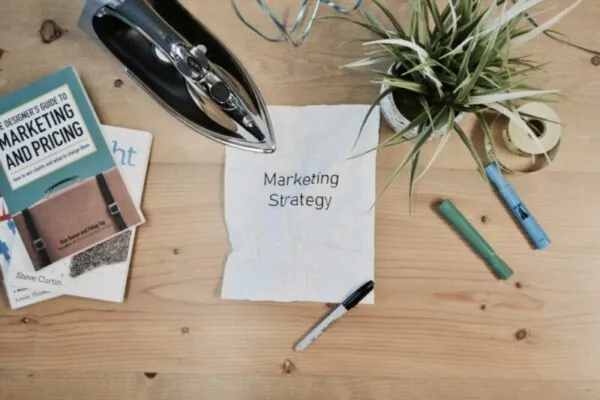 Brand strategy notebook and pens